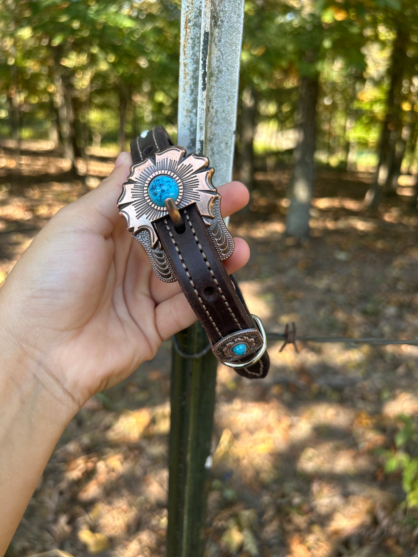 Antique copper buckle with white buck stitch