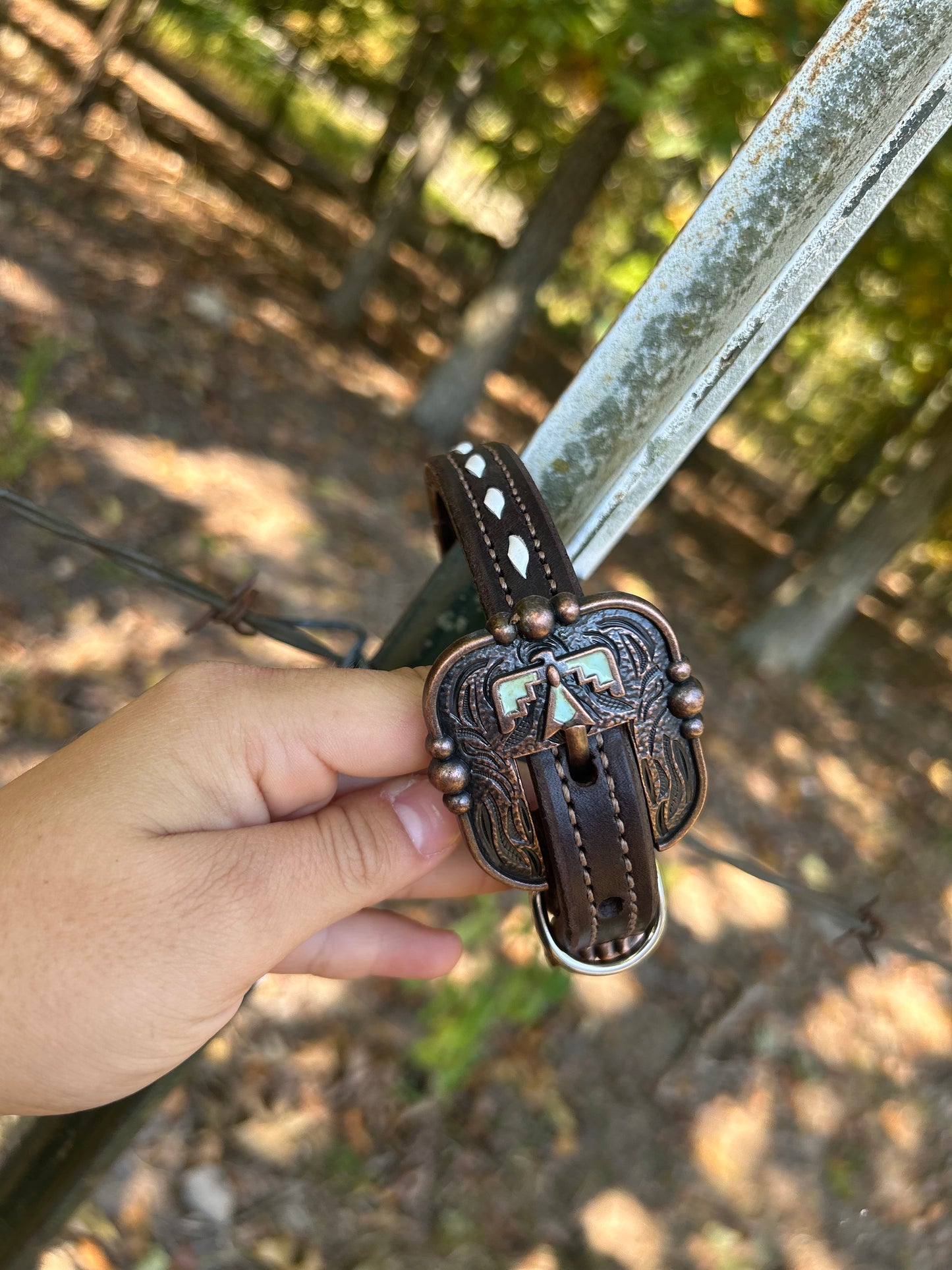 Thunderbird dog collar with white buck stitch