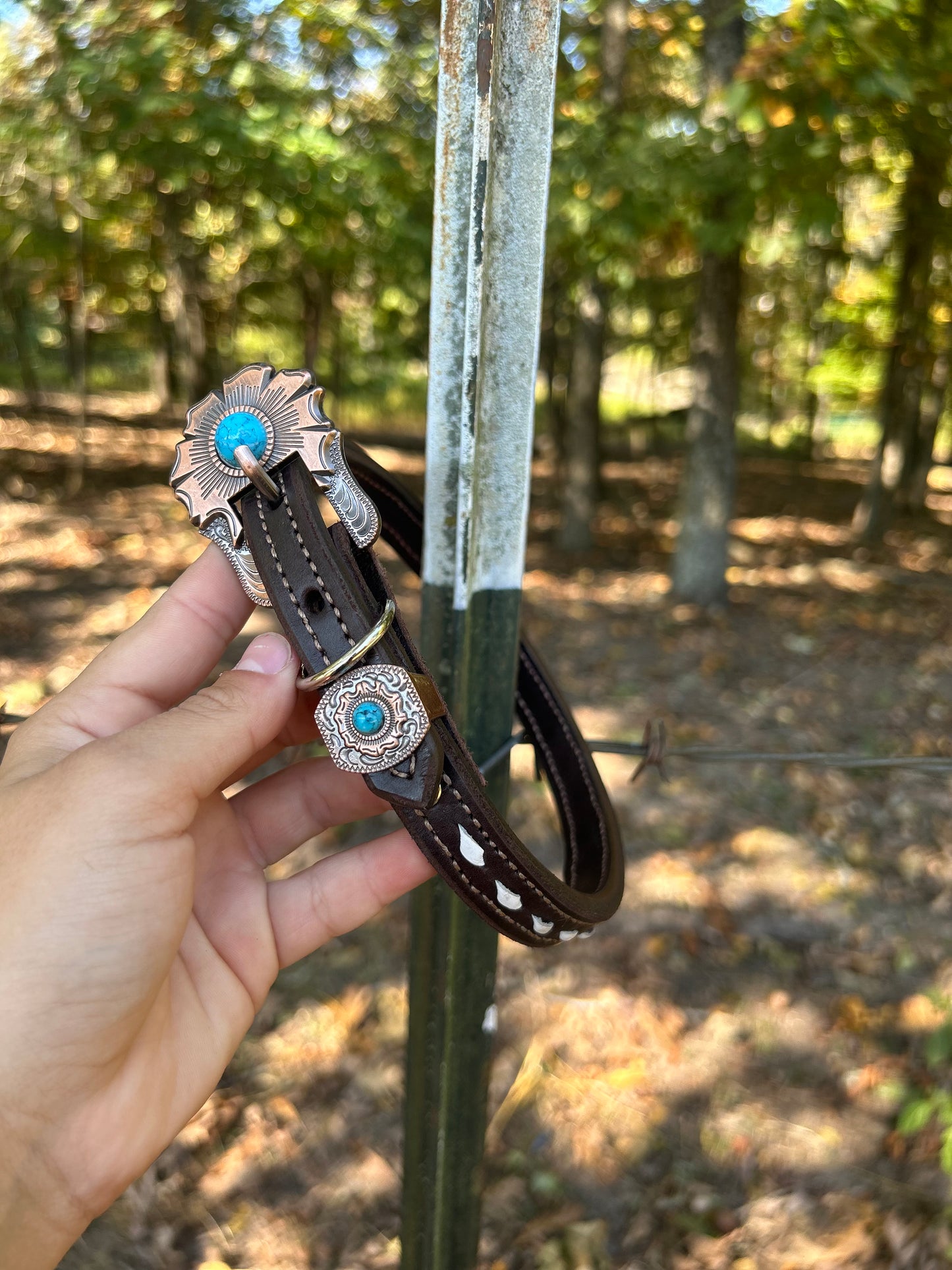 Antique copper buckle with white buck stitch